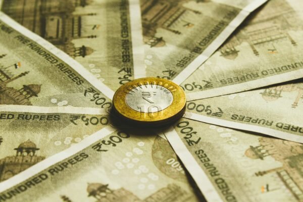 Rupee trades in narrow range; crude prices, global tensions weigh on sentiment