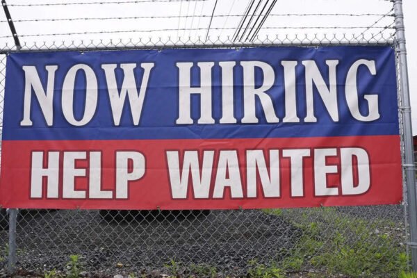 US applications for jobless benefits inch up for the first time in 7 weeks, but layoffs remain low