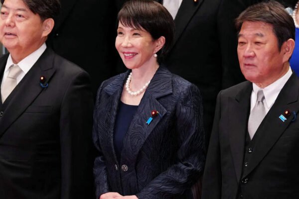Japan says it plans to tell Trump it will build up military, upgrade security strategy