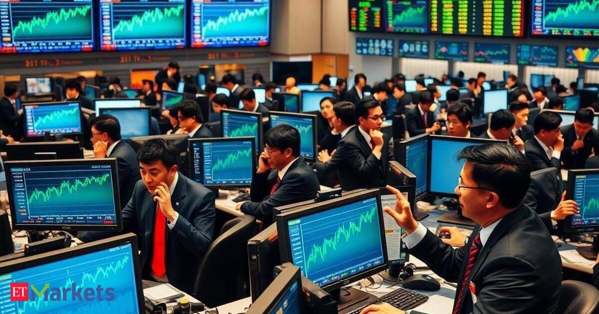 Asian stocks trade mixed, gold dips on China move